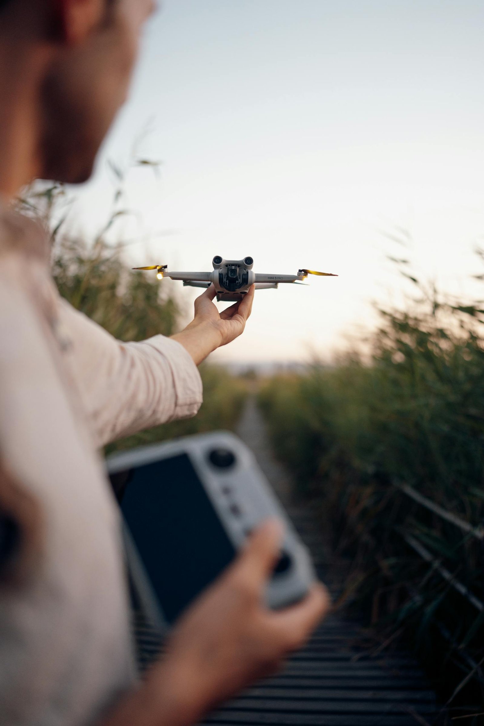 A Man Flying a Drone